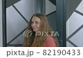 Attractive young woman, open door and comes to the beauty salon and welcomes the master 82190433