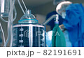 Close-up of a ventilator during an operation, FullHD shot. The movement is remembered by artificial lung ventilation, amid a ward with a patient and doctors. Pneumonia and tuberculosis, Covid 19 82191691