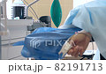 Close-up of a ventilator during an operation, FullHD shot. The movement is remembered by artificial lung ventilation, amid a ward with a patient and doctors. Pneumonia and tuberculosis, Covid 19 82191713