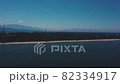 空撮　風力発電の風車　青い海と青い空 82334917
