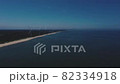 空撮　風力発電の風車　青い海と青い空 82334918