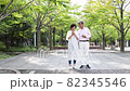 Senior couple talking while taking a walk 82345546