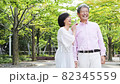Senior couple talking while taking a walk 82345559