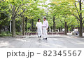 Senior couple talking while taking a walk 82345567