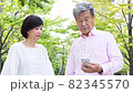 Senior couple talking while taking a walk 82345570