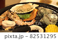Seafood barbecue griller's eyes 82531295