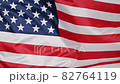 Background of US American flag waving in the wind 82764119
