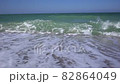waves with splashes on the seashore waves with splashes on the seashore 82864049