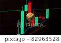 Uniswap uni gold crypto coin token symbol on the background of a trading chart  82963528
