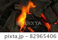 Burning coals for barbecue, top view 82965406