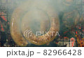 South African style sausage coil grilling on a barbecue, top view 82966428