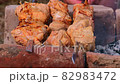 Man fries tradition kebabs shashlik on picnic. Close up. 82983472