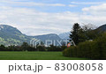 Slowmotion beautiful mountains landscape with moving Swiss flag in Switzerland Alps 83008058