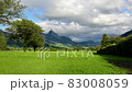 Time lapse beautiful mountains landscape with moving clouds in Switzerland Alps 83008059