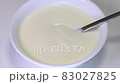Yogurt spoon cream bowl Bowl of fresh greek yogurt 83027825