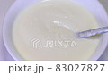Yogurt spoon cream bowl Bowl of fresh greek yogurt 83027827