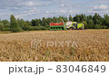Combine harvester on field of wheat, harvesting wheat, agriculture, harvest time  83046849