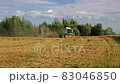 Combine harvester on field of wheat, harvesting wheat, agriculture, harvest time  83046850