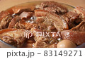 Cooking traditional Taiwanese braised pork belly. 83149271