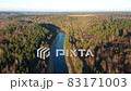 Flying above the water channel in the forest. Drone aerial footage 83171003