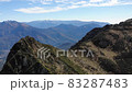 Drone over the top of the mountain: Flight over autumn mountain with forest soft light. Majestic landscape. FullHD 83287483