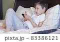 Little child using smart phone for drawing 83386121