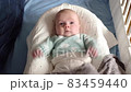 Little baby girl smiling resting on the morning 83459440