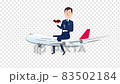舒適的飛機之旅_男人在機上放鬆和閱讀_透明背景 83502184