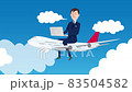 舒適的飛機旅行_一個在機上使用電腦工作的人 83504582