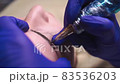Permanent makeup. Eyebrow tattoos, close up 83536203