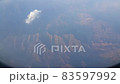 Beautiful cloud and blue sky view from the window of an airplane flying. 83597992