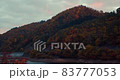 Autumn foliage mountain facing the dam 83777053