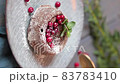 dessert chocolate fondant on a wooden background with berry decoration. Dessert cut with a fork.vertical video 83783410