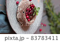 dessert chocolate fondant on a wooden background with berry decoration. Dessert cut with a fork.vertical video 83783411