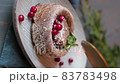 dessert chocolate fondant on a wooden background with berry decoration. Dessert cut with a fork.vertical video 83783498