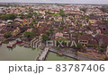 Hoi An cityscape footbridge over channel in town district 83787406