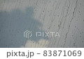 Raindrops motion on glass window 83871069