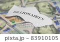 Billionaires income tax. Pile of us dollar banknotes and pieces of paper with Billionaires text. Billionaires income tax proposed in US Senat 83910105