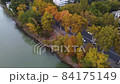 Seagulls and autumn trees by the riverside highway 84175149