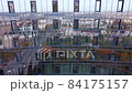 City and traffic reflections on the glass building 84175157