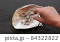 Jeweler Showcasing Rings in Seashell 84322822