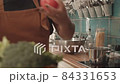Putting Tomato into Boiling Water 84331653