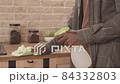 Man Cleaning Kitchen 84332803