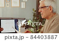 Teacher Working With Senior Man 84403887