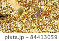 Moving Golden Glitter Lights. Close up. 84413059