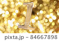Golden number one and golden screen background. Close up. 84667898