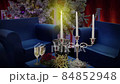 congratulations and an invitation to the office New Year's Christmas corporate party - a party with candles and champagne  84852948