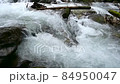 Mountain river close-up in slow motion 84950047