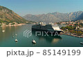 Wonderful view of the city of Kotor and the docked cruise ship in the port, Montenegro. 85149199