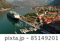 Wonderful view of the city of Kotor and the docked cruise ship in the port, Montenegro. 85149201